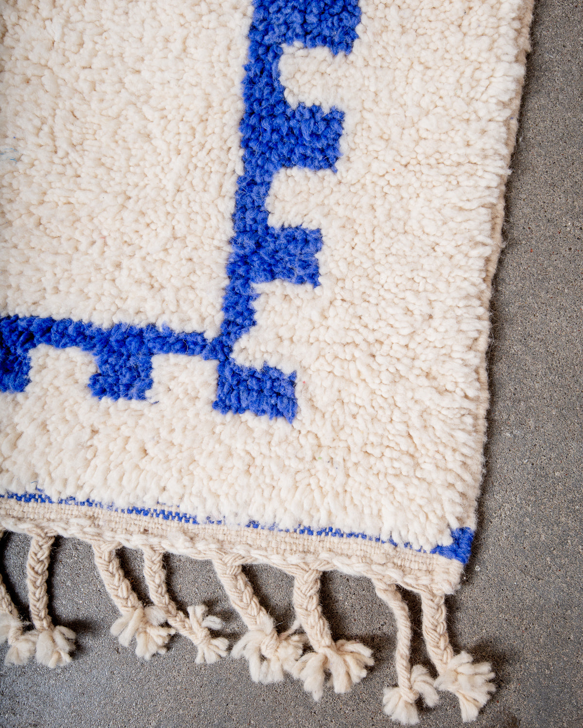 Modern, designer, handcrafted Berber rug from Morocco. Beniourain carpet with beautiful colours and patterns and fluffy wool texture.